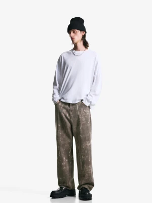 Bershka Spodnie Superbaggy Z Nadrukiem Mężczyzna Brązowy