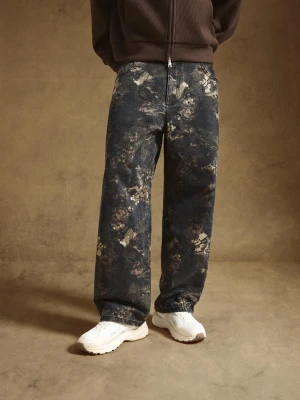 Bershka Spodnie Superbaggy Z Nadrukiem Mężczyzna Khaki