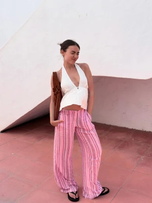 Bershka Spodnie W Paski Kobieta Różowy