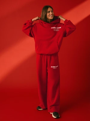 Bershka Spodnie Z Dzianiny Dresowej Z Szerokimi Nogawkami Z Nadrukiem Kobieta Czerwony