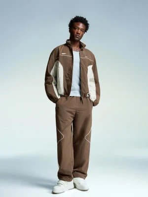 Bershka Techniczne Spodnie O Kroju Super Baggy Mężczyzna Brązowy