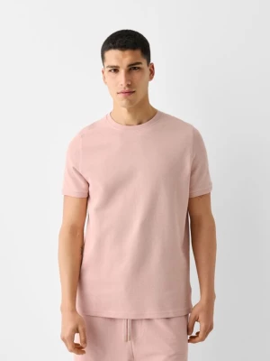 Bershka Teksturowana Koszulka Z Krótkim Rękawem Mężczyzna Różowy