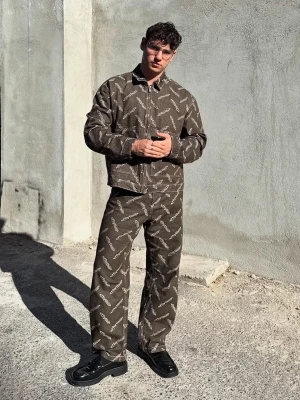 Bershka Żakardowe Jeansy O Kroju Baggy Mężczyzna Brązowy