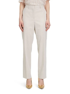 BETTY & CO Spodnie w kolorze kremowym rozmiar: 40