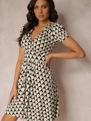 Beżowa Rozkloszowana Sukienka Mini z Kopertowym Dekoltem i Poduszkami w Ramionach Saniza by swan