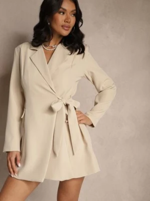 Beżowa Sukienka Kopertowa Ozdobiona Imitacją Kieszeni Davirnas lovery