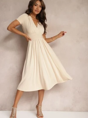 Beżowa Sukienka Taliowana z Kopertowym Dekoltem o Rozkloszowanym Kroju Rimadea by swan