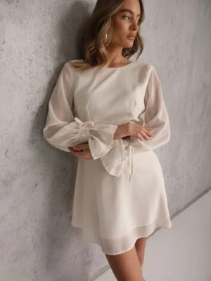 Beżowa Sukienka Vices Ozdobiona Transparentnymi Rękawami i Kropkami Celziva