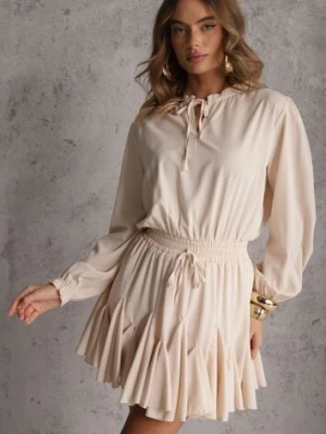 Beżowa Sukienka z Wiskozą o Rozkloszowanym Kroju z Falbankami i Wiązaniem Meriianes ann gissy