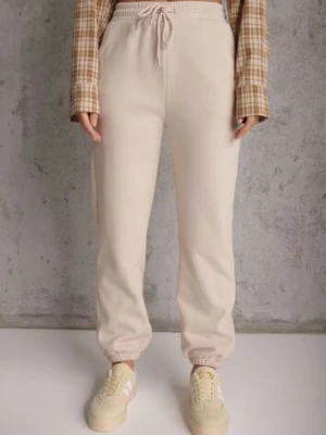 Beżowe Dresowe Spodnie z Bawełny z Ociepleniem Ozdobione Sznurkiem Citila defox