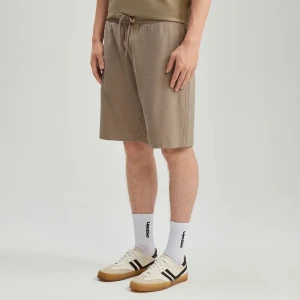 Beżowe dresowe szorty ze strukturalnej dzianiny House