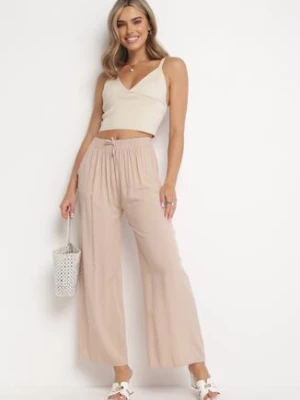 Beżowe Gładkie Spodnie z Gumką w Pasie i Szerokimi Nogawkami Alathera rosa