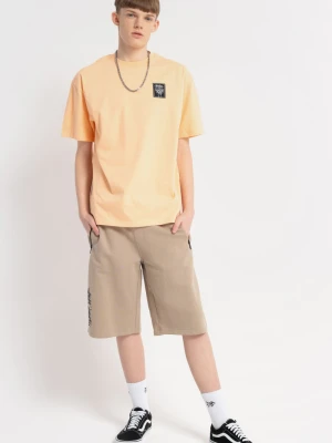 Beżowe krótkie spodenki dresowe z nadrukiem na nogawce Reporter