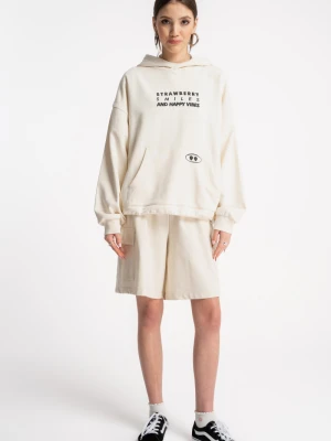 Beżowe krótkie spodenki z naszywanymi kieszeniami Reporter