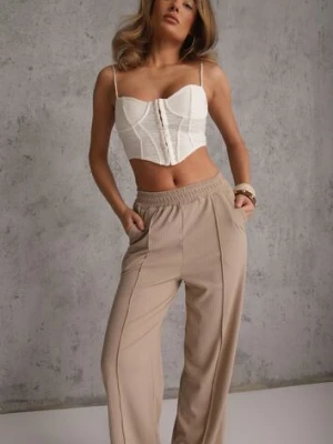 Beżowe Prążkowane Spodnie High Waist z Szerokimi Nogawkami Ginorria glo-story
