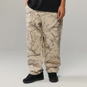 Beżowe spodnie baggy z nadrukiem camo tree House