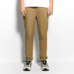 Beżowe spodnie carrot fit na gumce House