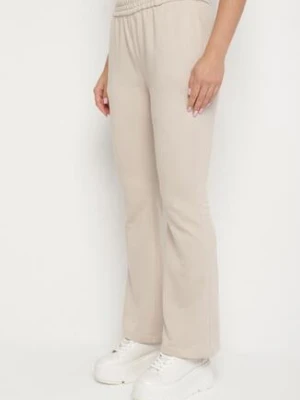 Beżowe Spodnie Dresowe o Kroju Dzwonów z Gumką w Talii Efravella defox