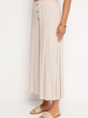 Beżowe Spodnie Palazzo z Wiskozy z Gumką w Pasie Ozdobione Guzikami z Nogawkami 3/4 Efilis cflo