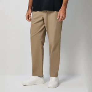 Beżowe spodnie relaxed fit z elastycznym pasem i zapięciem House