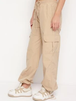 Beżowe Spodnie Typu Bojówki z Gumką w Pasie z Kieszeniami i Ściągaczami Lomienna daysie