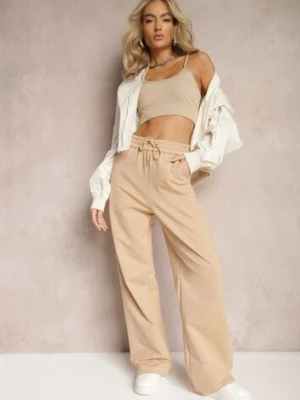 Beżowe Szerokie Spodnie Dresowe z Elastycznej Bawełny Niarti by swan