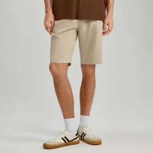 Beżowe szorty z lnem i skośnymi kieszeniami House