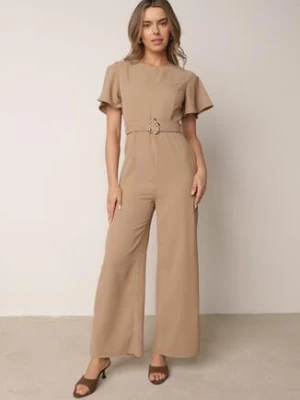 Beżowy Kombinezon VICES z Paskiem i Geometryczną Klamrą Elinassa