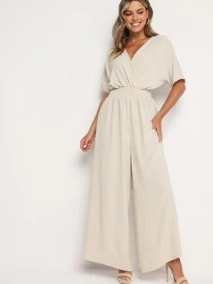 Beżowy Kopertowy Kombinezon z Gumką w Talii i Szerokimi Nogawkami Vimashea lovery