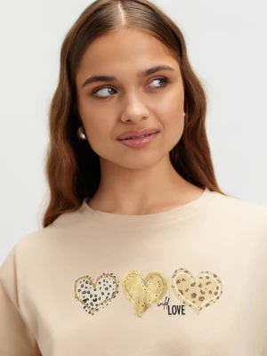 Beżowy top z grafiką Top Secret