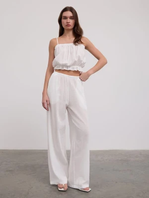 BGN Spodnie w kolorze białym rozmiar: 36