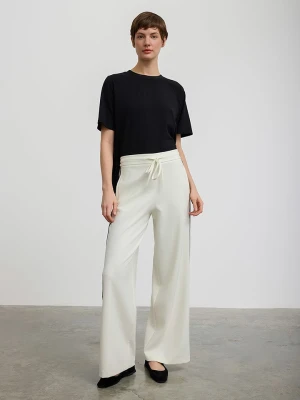 BGN Spodnie w kolorze kremowym rozmiar: 36