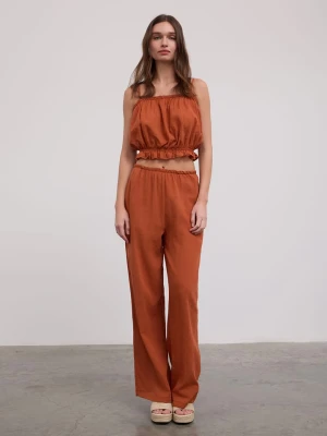 BGN Spodnie w kolorze pomarańczowym rozmiar: 34