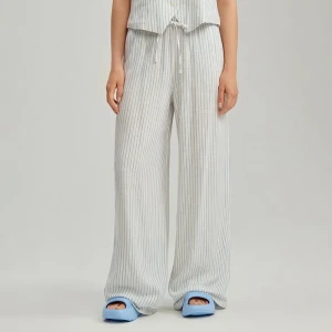 Białe spodnie wide leg mid waist z domieszką lnu House