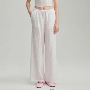 Białe spodnie wide leg z tkaniny z haftem angielskim House