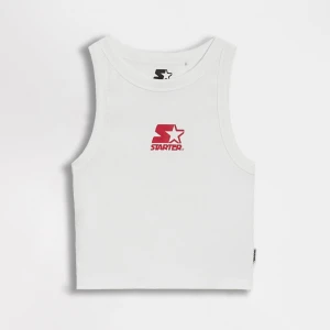 Biały crop top z nadrukiem Starter House