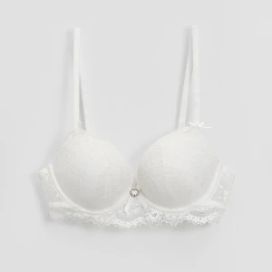 Biały koronkowy biustonosz z kokardkami i serduszkiem House