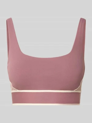 biustonosz sport o kroju slim fit z detal z logo Fabletics Brudnoróżowy