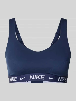 biustonosz sportowy o kroju slim fit z detalem z logo model 'Indy' Nike Training