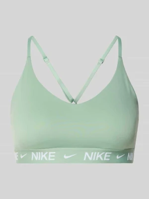 Biustonosz sportowy o kroju slim fit z nadrukiem z logo model 'Indy' Nike Training
