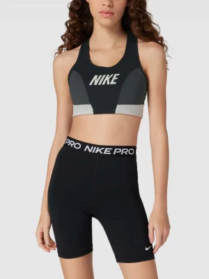 Biustonosz sportowy z nadrukiem z logo Nike Training