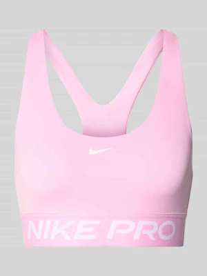 Biustonosz sportowy z pasem z logo Nike Różowy