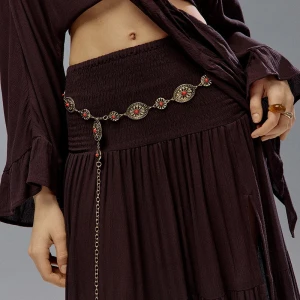 Biżuteryjny pasek z czerwonymi oczkami House