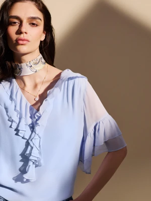 Błękitna bluzka z żabotem TARANKO