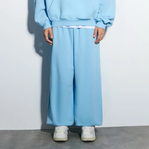 Błękitne spodnie dresowe super baggy fit basic House