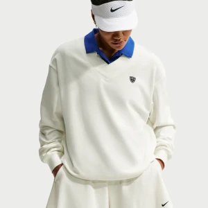 Bluza damska do golfa z dzianiny Dri-FIT Nike Fairway Fresh - Biel
