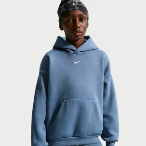 Nierozpinana bluza z kapturem z dzianiny dla dużych dzieci Nike Solo Swoosh - Niebieski