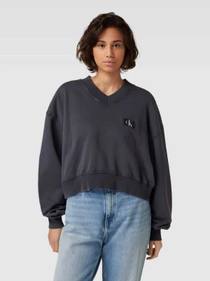 Bluza o kroju oversized z dekoltem w serek Calvin Klein Jeans