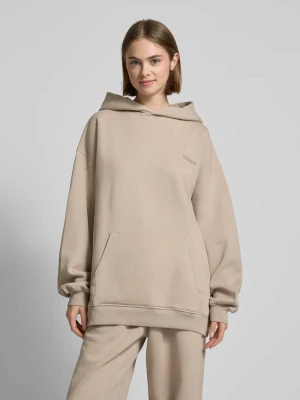 Bluza o kroju oversized z kapturem i detalem z logo model ‘Unity’ Karo Kauer