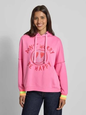 Bluza o kroju oversized z kapturem, obszyciem kamieniami stras i nadrukiem z motywem miss goodlife